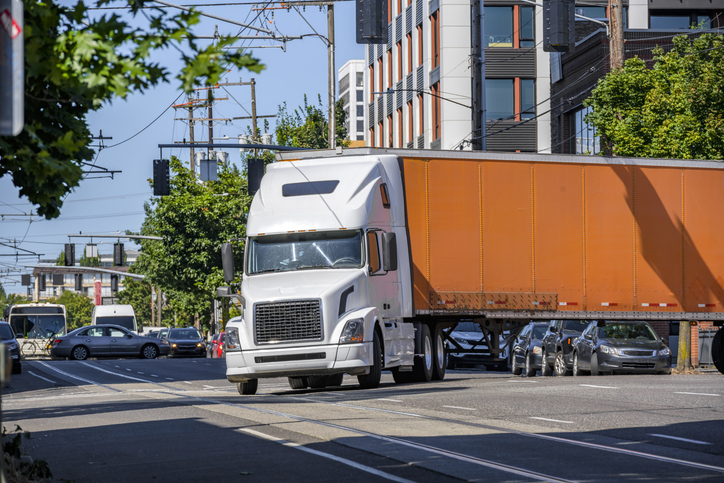 Semi truck turning in an intersection - Why you need a truck accident lawyer
